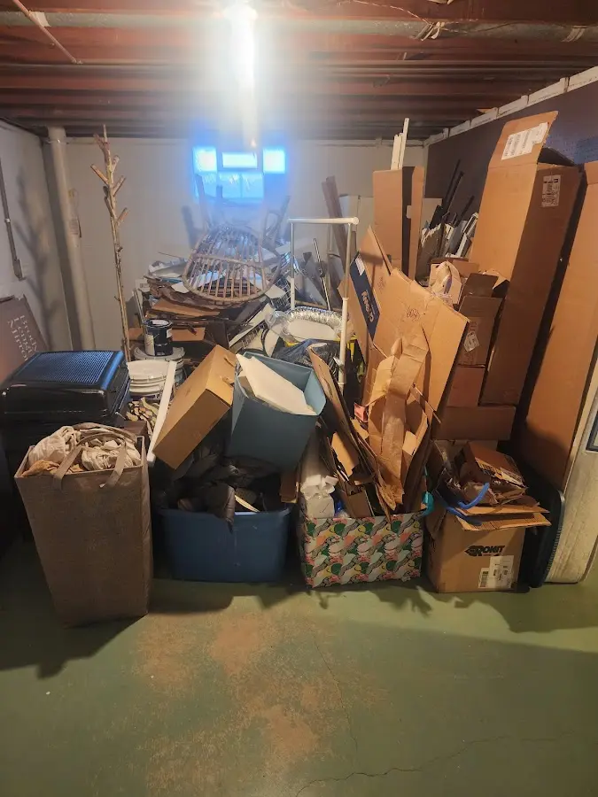 Roll-off dumpster container at job site for 4 Yard Dumpster Rental in South Sioux City